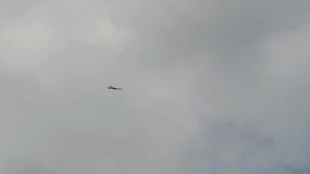 View of the sky with white clouds and Chula kites (Thai kites)