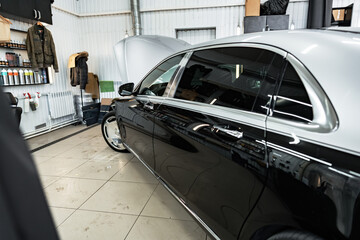 Modern car in a car service close up