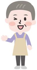 エプロンをつけて家事をするシニアの男性