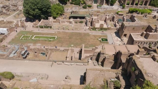 Wide view of The Roman Forum, Forum Romanum, ruins of ancient landmark buildings, Rome.