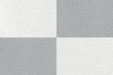 Texture of craft white and gray paper background with cells pattern, macro. Vintage dense kraft...