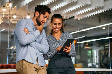 Team of young creative marketing experts brainstorming during work