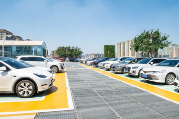 Outdoor parking lot with modern  buildings and sky background. © zhikun sun
