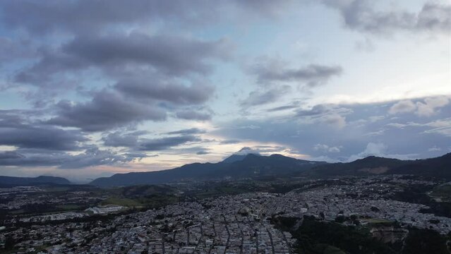 Aerial footage with drone to a volcano in Guatemala City at the sunset