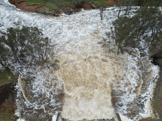 Lake Eppalock dam spillway overflowing into the Campaspe River near Bendigo after heavy spring rain...