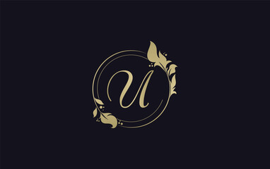 Golden circle leaf and beauty logo design with the letters and alphabets for brand and business