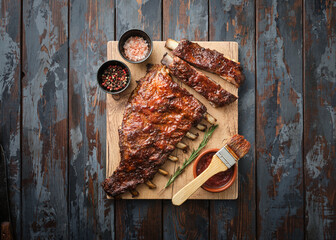 Delicious barbecued ribs seasoned with a spicy basting sauce. Smoked American style pork ribs