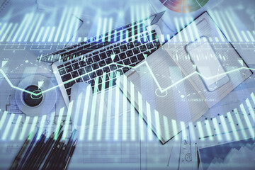 Multi exposure of data drawing hologram over topview of study desk background with computer. Concept of technology.