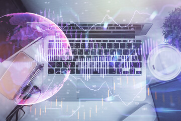 Multi exposure of financial chart drawing over table background with computer. Concept of research. Top view.
