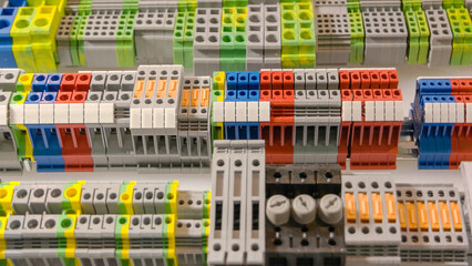 Close-up large electrical terminal block machine panel. Quick connect and release terminal connector.