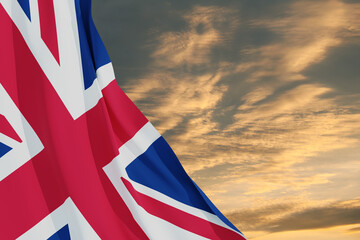 National flags of United Kingdom on sunset sky background. Background with place for your text. 3d...