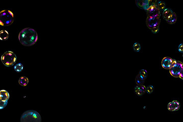 Soap bubbles isolated on a black background.