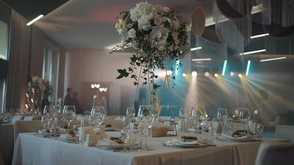 Festive table setting. Wine Glass on the banquet table. Night Party at a fancy restaurant. Celebration event on holidays.
