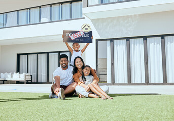 Property, happy family and sold sign with smile, relax and excited people rest, sit and bond on grass. Real estate, house sale and family moving into new home together, joy and carefree relocating - obrazy, fototapety, plakaty