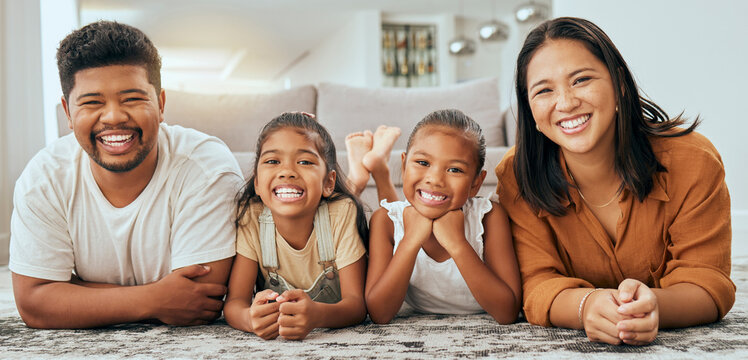 Happy family, relax and portrait on home carpet with young and cheerful filipino children. Daughter, mother and father smile on floor together with happy kids in Philippines family home.