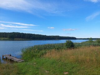 Sunset over the lake in the village.