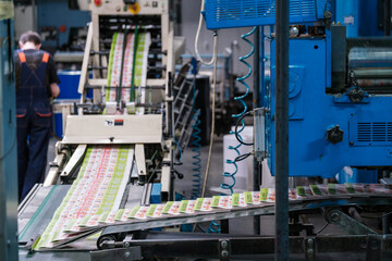 Conveyor belt with magazines in print shop