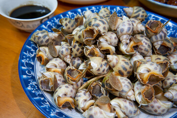 A plate of sweet and delicious boiled snails