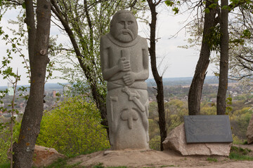 Kurgan stelae or stone baba in Ukrainian steppe photo
