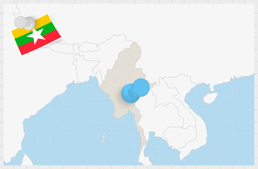Map of Myanmar with a pinned blue pin. Pinned flag of Myanmar.