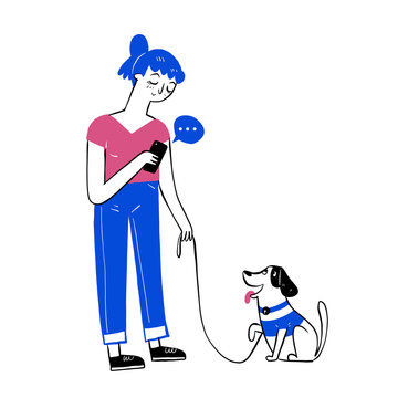 The pretty girl walking her dog in the park with a leash while texting on her smartphone.
