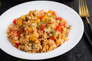 Tomato rice with vegetables and chicken. Healthy food. Healthy lifestyle.