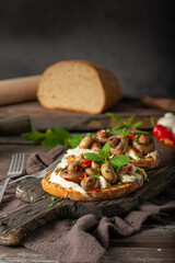 Spread on bread with ragout mushrooms