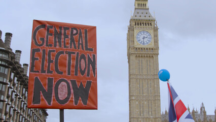 UK General election protest banner being held in London protesting new prime minister