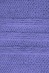 Organic knitted background with detail woven threads.