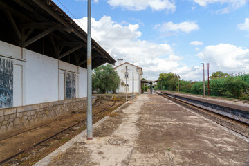 Fototapeta na wymiar remote railway siding showing platform and train tracks