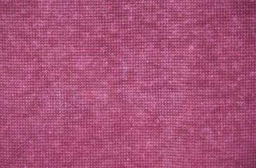 Fondo con detalle y textura de superficie de tejido de tonos purpura 