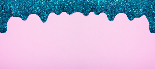 Banner with shiny border made of glitter gel on a colored background. Christmas background with copy space