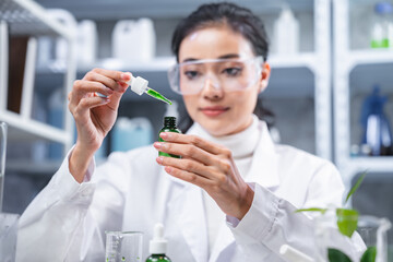chemistry scientist working on biotechnology cosmetic research with natural herb medicine...