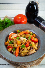 Pasta with fried chicken, mushrooms, pepper and pumpkin