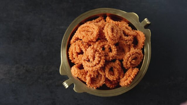 Rice murukku savoury Arisi murukku chakli chakali Pongal festival snack deep fried coconut oil traditional South Indian chennai Tamil Nadu India Kerala Sri Lanka, Onam, Vishu, Diwali Makar Sankranti.