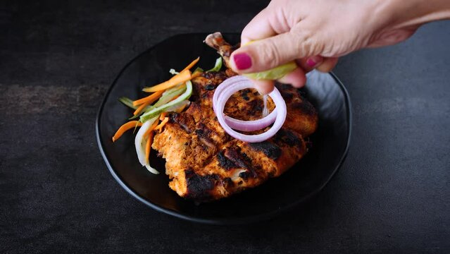 Alfaham Chicken , Arabian spicy food tandoori whole chicken Bengaluru, India . Platter served with salads. Al Faham Charcoal Grilled Chicken in India . 4k video footage.