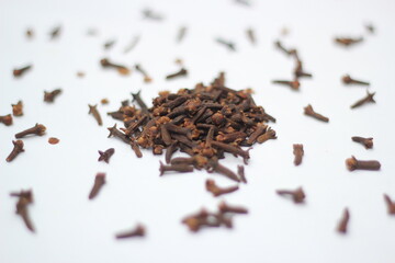Dried cloves on white background, dried herb isolated