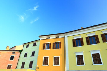 Fototapeta na wymiar Porec, touristic destination in Istria, Croatia. Colorful house facades.