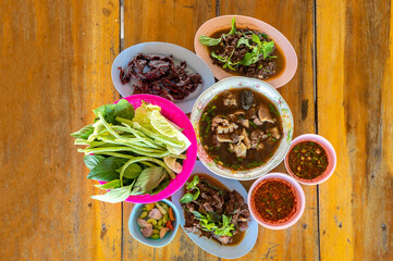 Set of local thai food and thai herb, Beef in Spicy Condiment and vegetable, North-Eastern Food of Thailand
