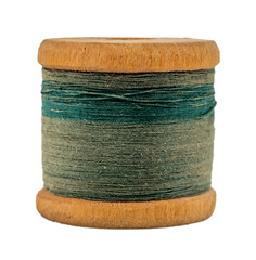 Wooden spool with colored threads close-up