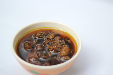 Homemade mango pickle isolated, Spicy pickle with red naga chili