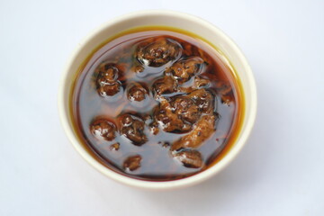 Homemade mango pickle isolated, Spicy pickle with red naga chili
