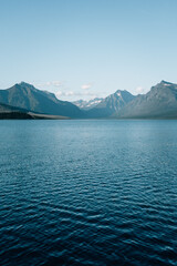calm lake and mountains with blue sky