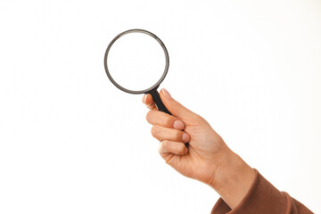 Close up photo of woman hand holding magnifying glass over white background