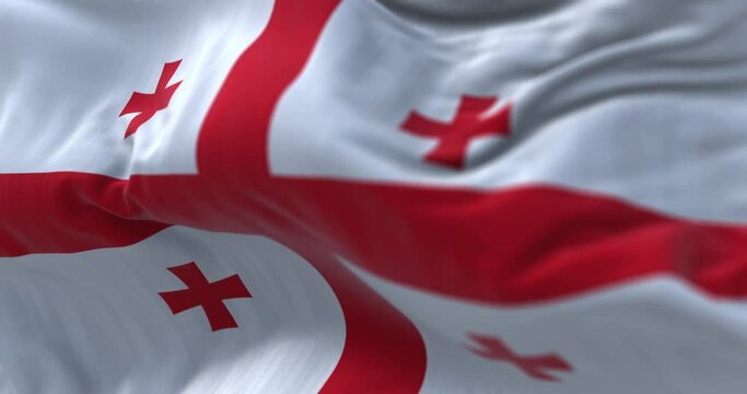 Close-up view of the Georgia national flag waving in the wind