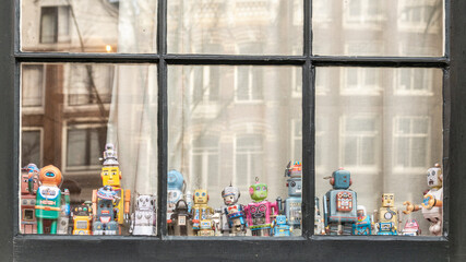 Retro Robot Toys displayed in a window