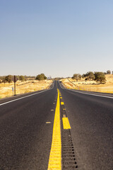 Asphalt road and country landscape