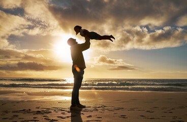 Beach silhouette, father and child play, bond or enjoy fun quality time together in Rio de Janeiro brazil. Happy family love, sunset flare of freedom peace for dad and youth kid playing on ocean sand