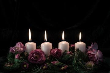 Obraz na płótnie Canvas advent candles burning, copy space, isolated, black background