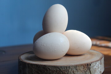 free-range chicken eggs piled on the table